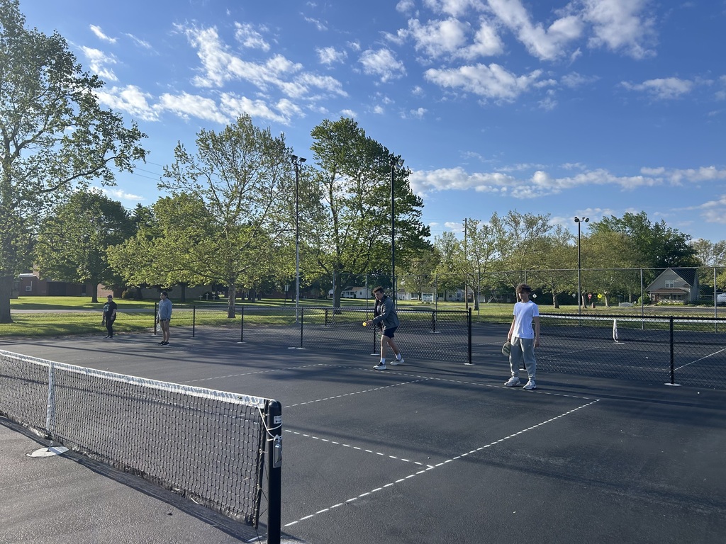 Students playing on the Pickle Ball courts