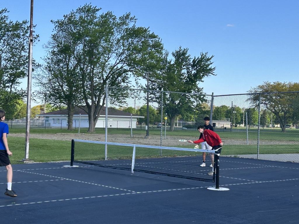 Students playing on the Pickle Ball courts