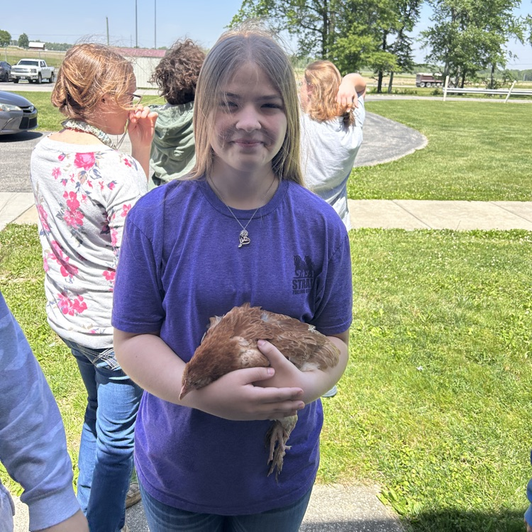 student with egg layer