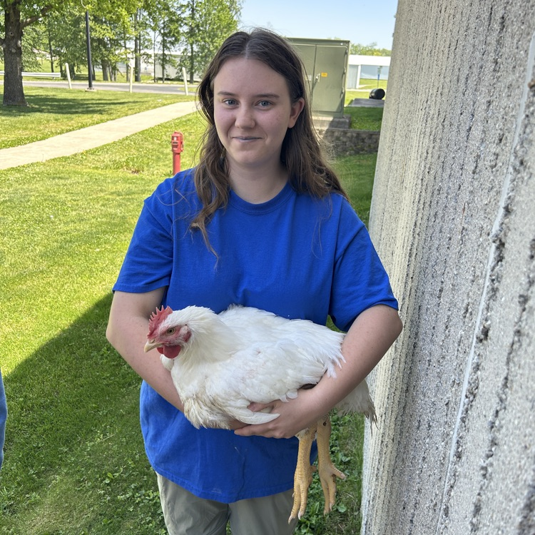 student with broiler