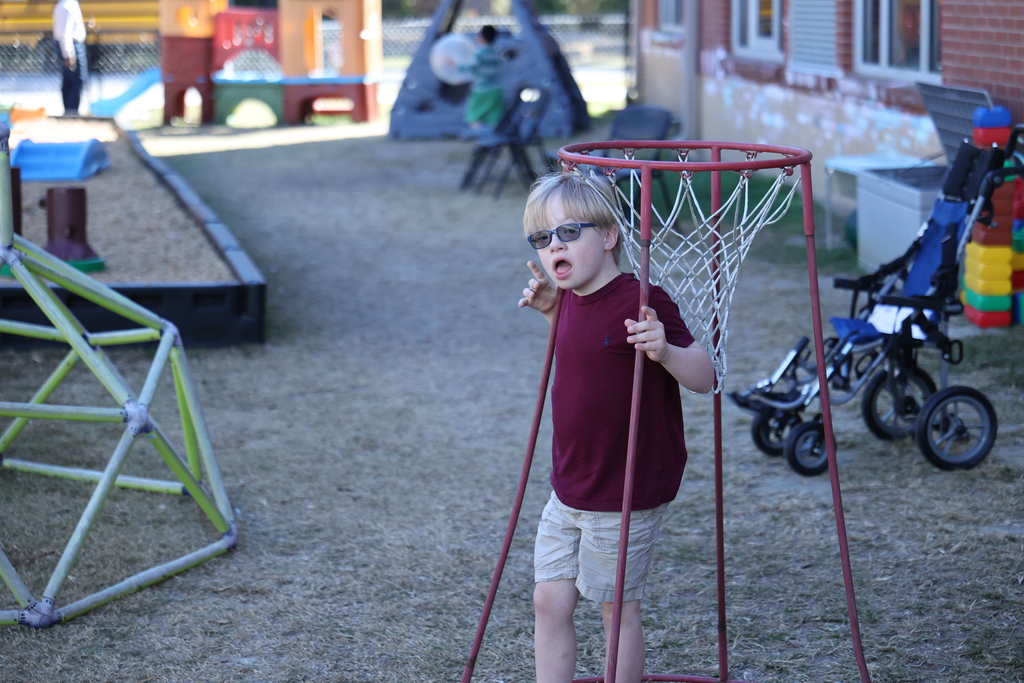 Elementary friend playing on school playground