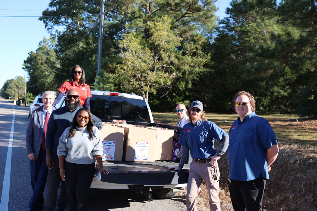 Central Office Staff & Board members pack up food donated at GW this morning