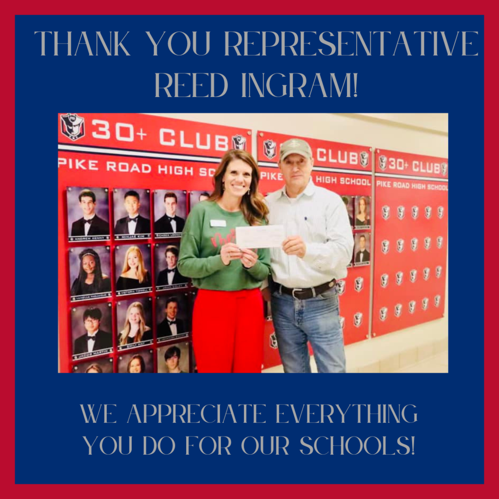 Principal Maness holding a check standing with Representative Reed Ingram.