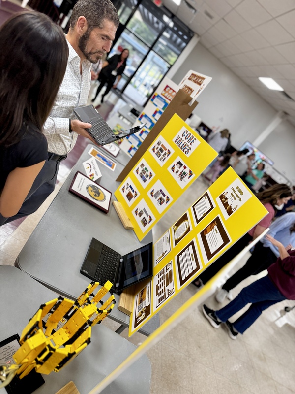 Students apply design thinking and problem-solving skills through hands-on engineering challenges, demonstrating how classroom learning translates into real-world application.