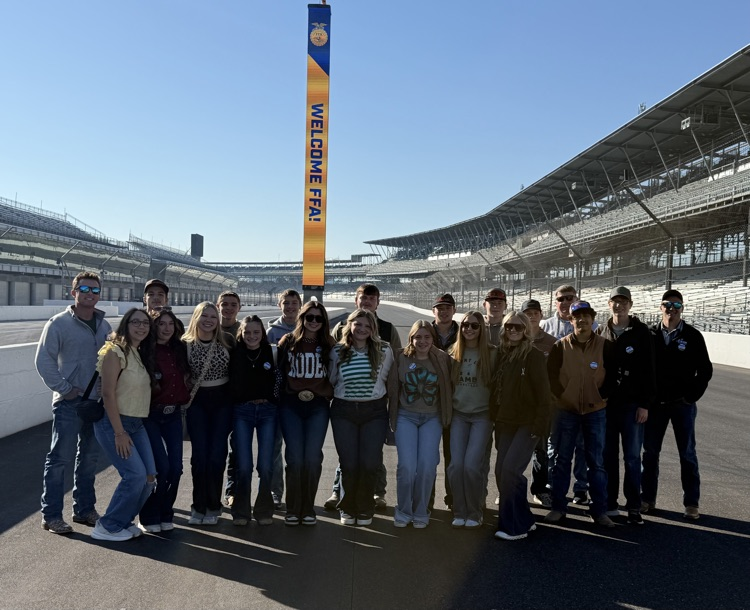 group photo at the speedway