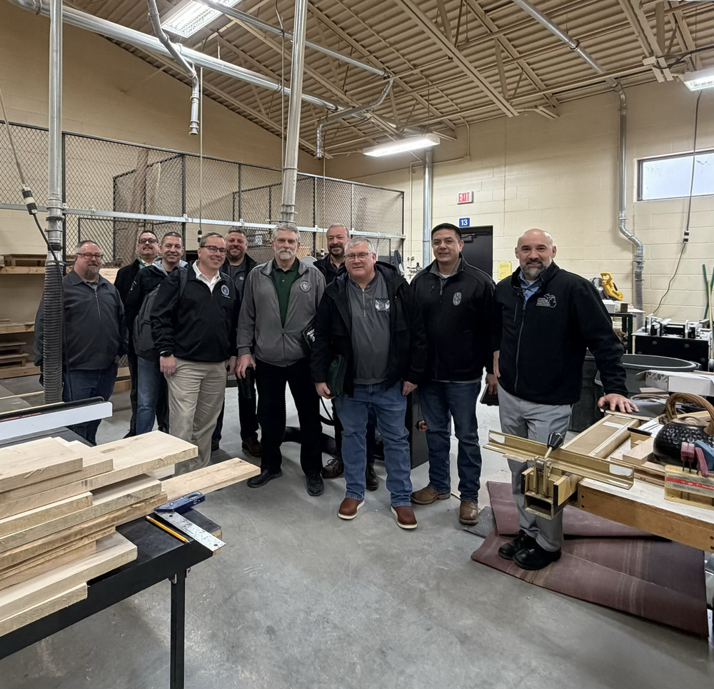 Local Union leaders in the PHS woodshop