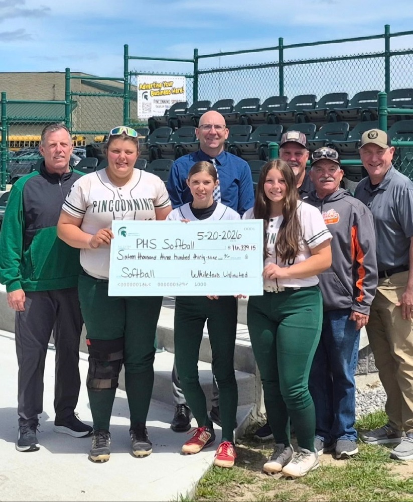 Whitetails Unlimited presents check to Pinconning Softball