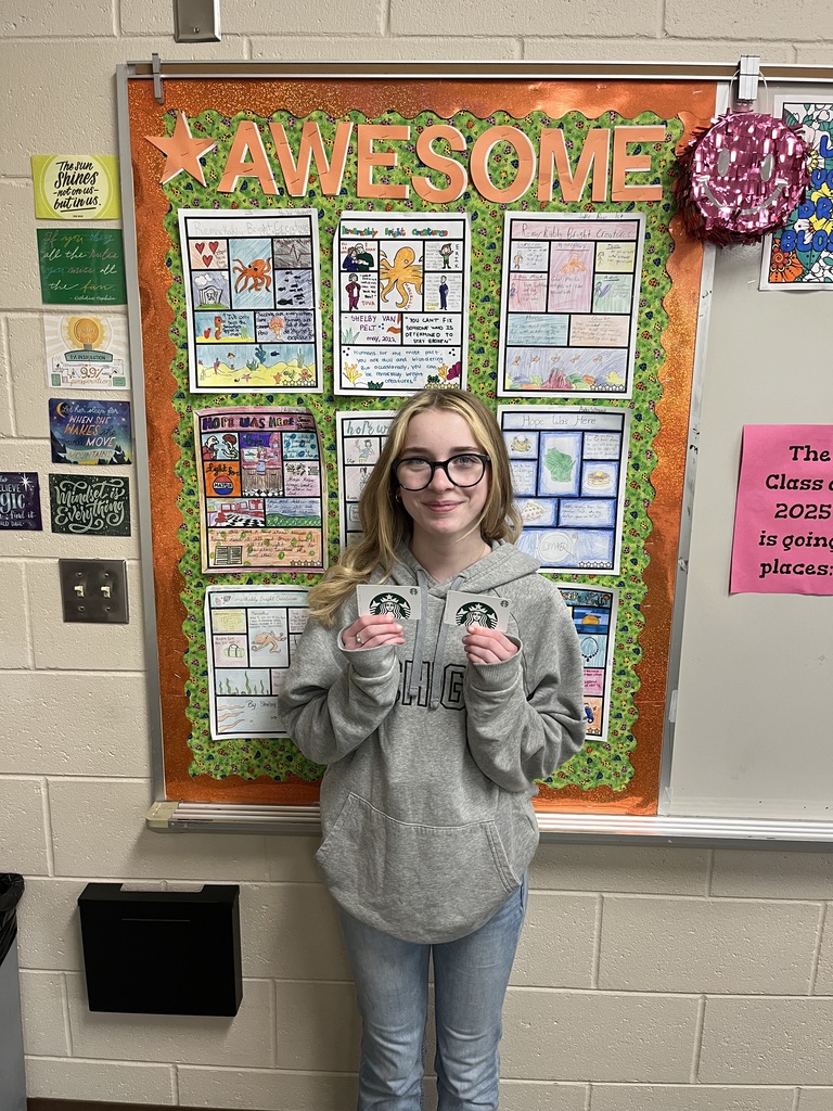 Jayde Corbat holding a gift card
