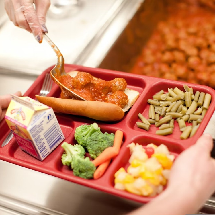 school lunch tray with food and milk. 