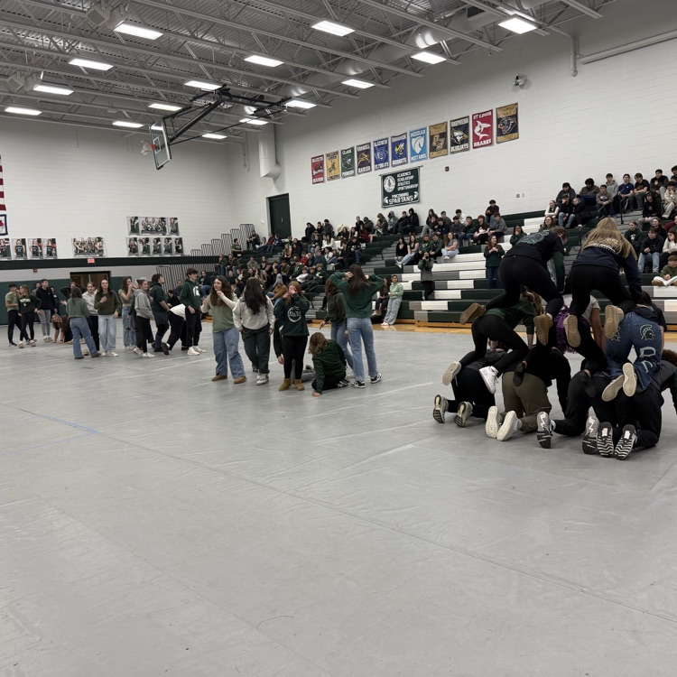 Students are using their bodies to make shapes