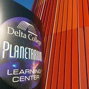 Delta Planetarium Sign