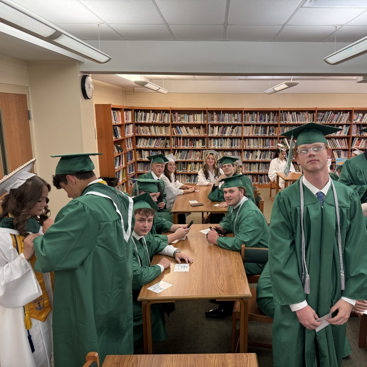 Graduates in the library