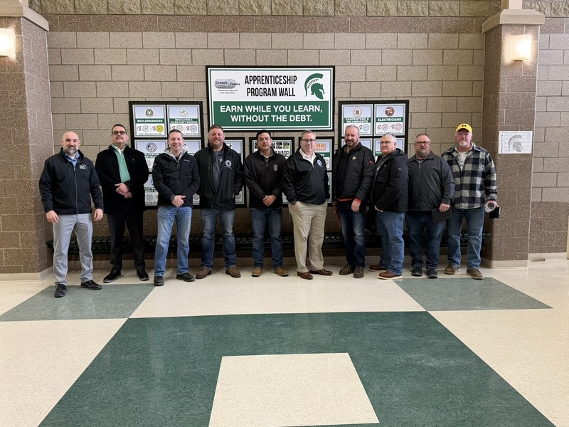 Union leaders in front of Job Board