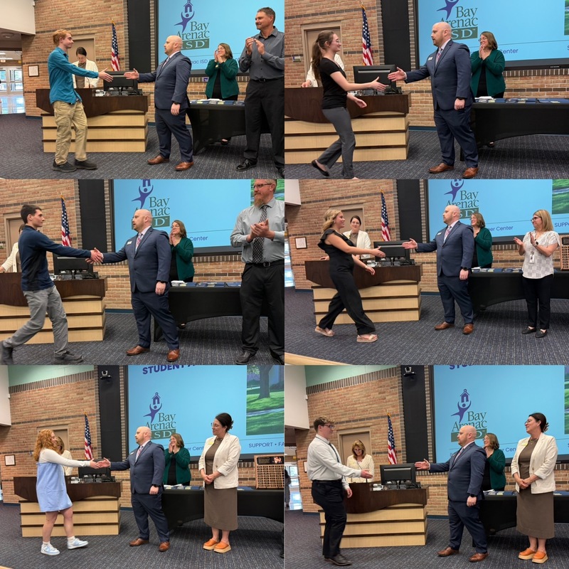 6 students shake principals hand