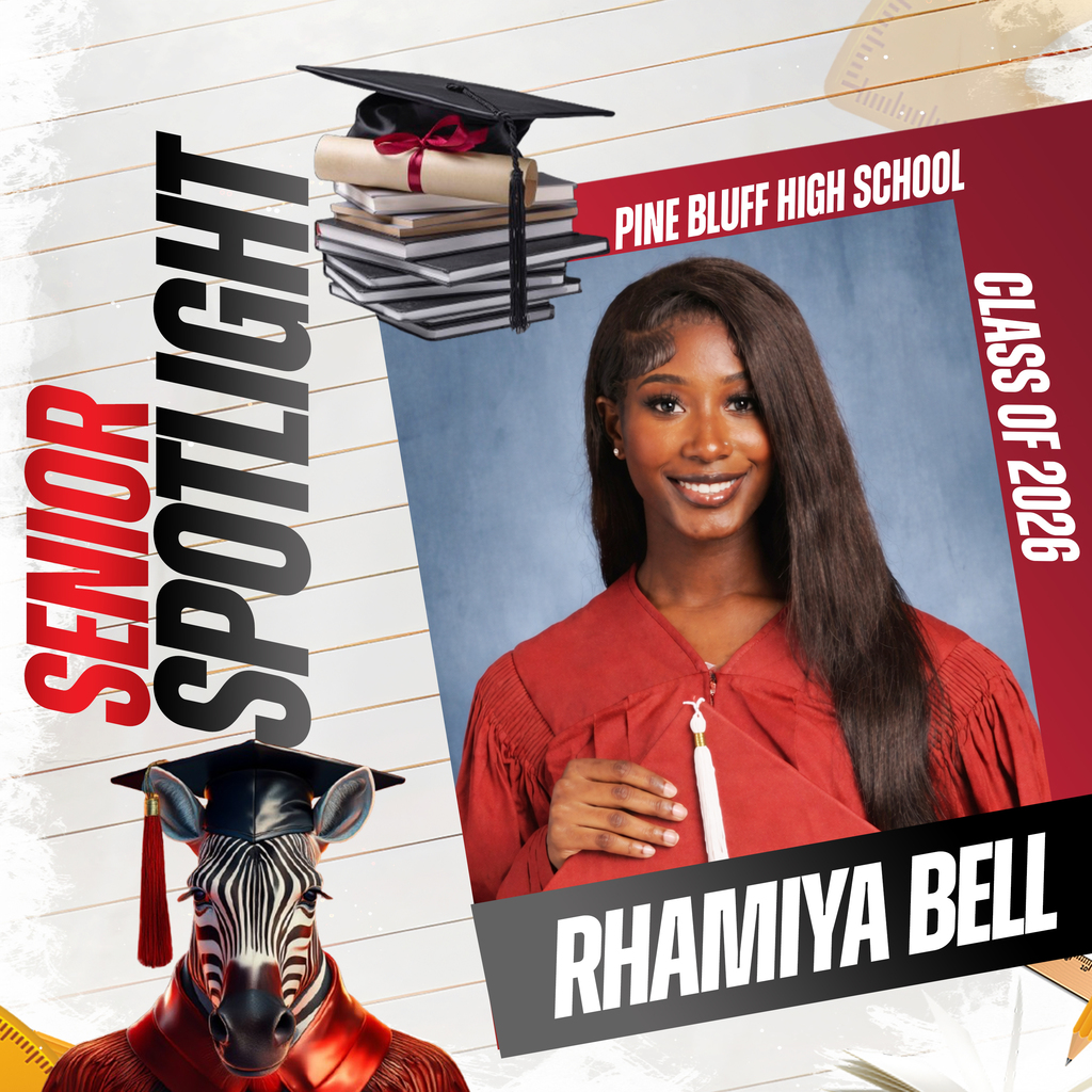 A school graduation ad for senior Rhamiya Bell. She wears a graduation gown and holds a tassel.