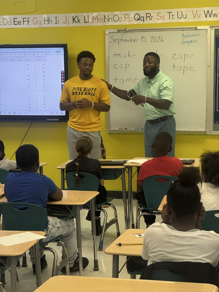 Mr. Stokes and an UAPB athlete.