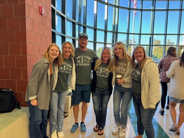The 5th grade team sporting their matching shirts for back to school breakfast.