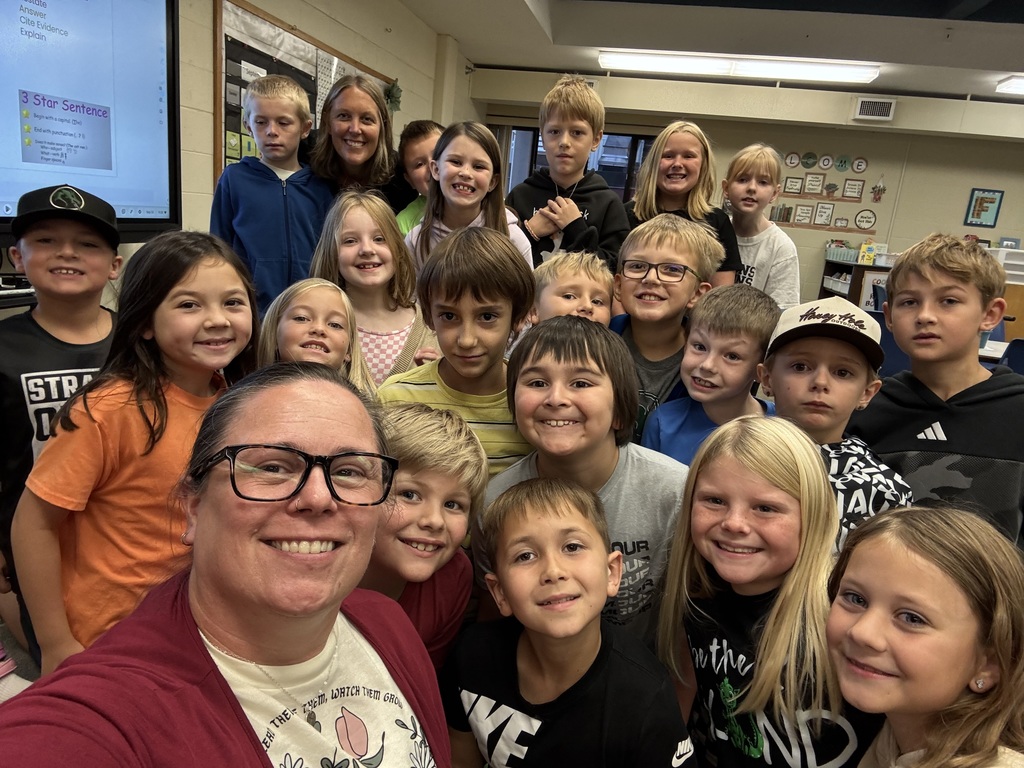 Pine City Elementary Students group photos with Principal Kloeckl