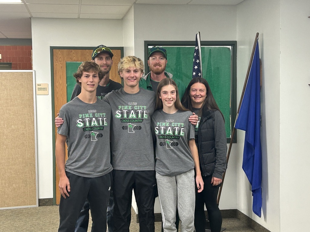 Cross Country State Qualifiers pose with their coaches