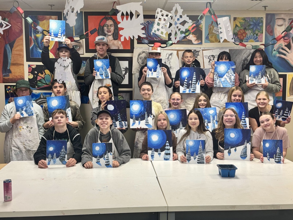 7th grade art class posing with their completed painting.