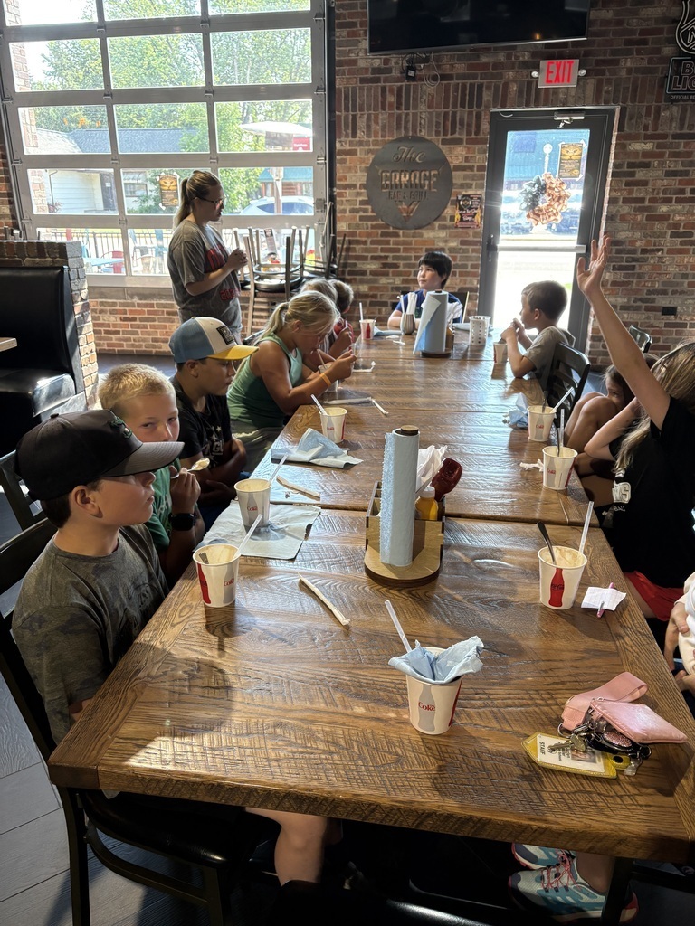 4th grade students enjoy a special treat from The Garage while on their summer field trip.