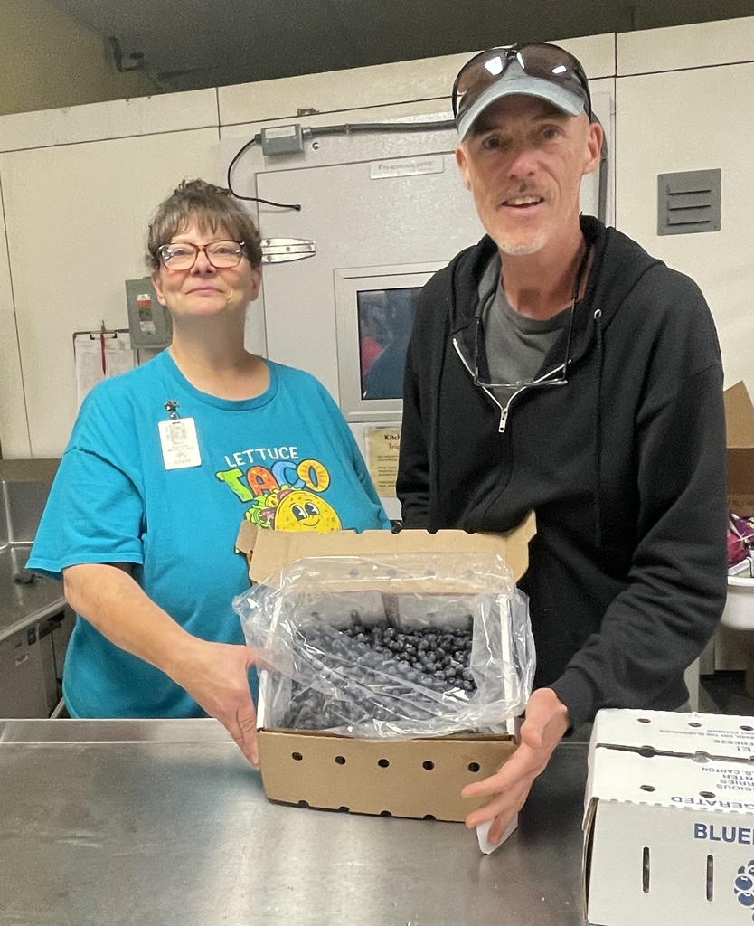 Delivery of blueberries to Pine City Food Services from Bayfield WI farm.