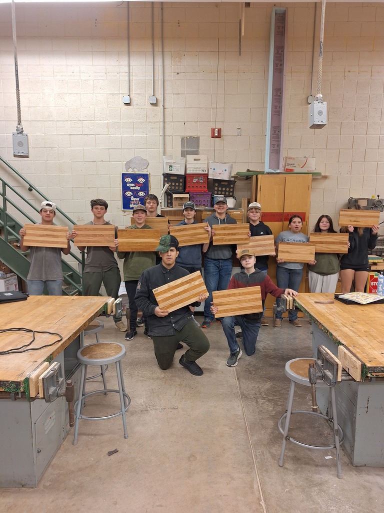 Industrial Tech students at Pine City High School show off their projects.