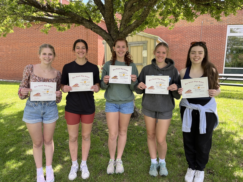 students holding certificates