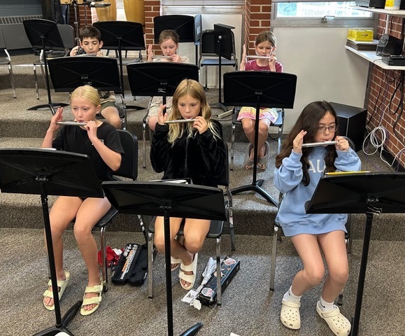students playing instruments