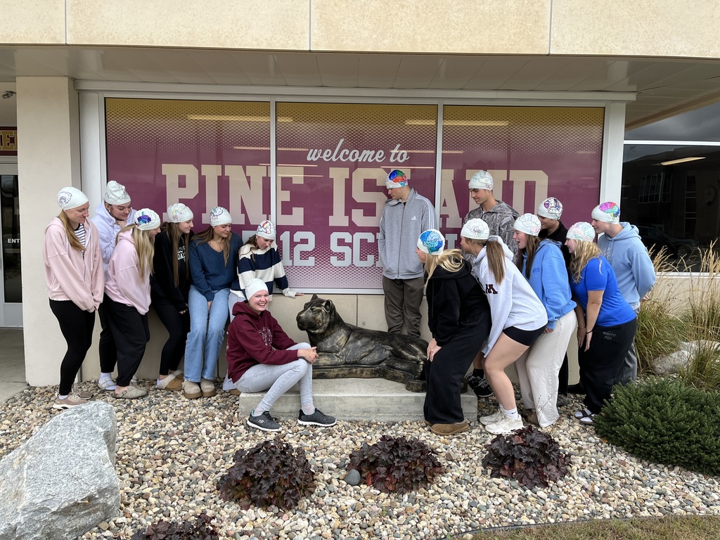 students with swim caps on 