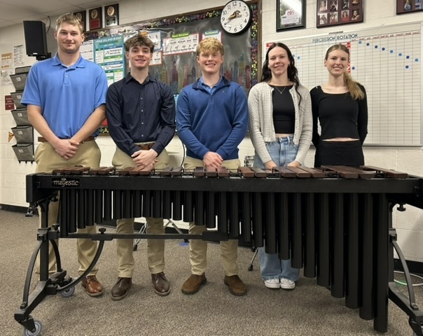 Pine Island High School Solo/Ensemble Contest is happening at school all day today. Pictured are two of the band senior ensembles ready to perform for their last high school contest.  As part of the curriculum, every band, choir, and orchestra student in grades 9-12 are required to perform a solo or small ensemble for the event. In addition, grade 7-8 orchestra students also perform solos. The students are scored by judges from outside of the school district.  Good luck to all of our musicians.