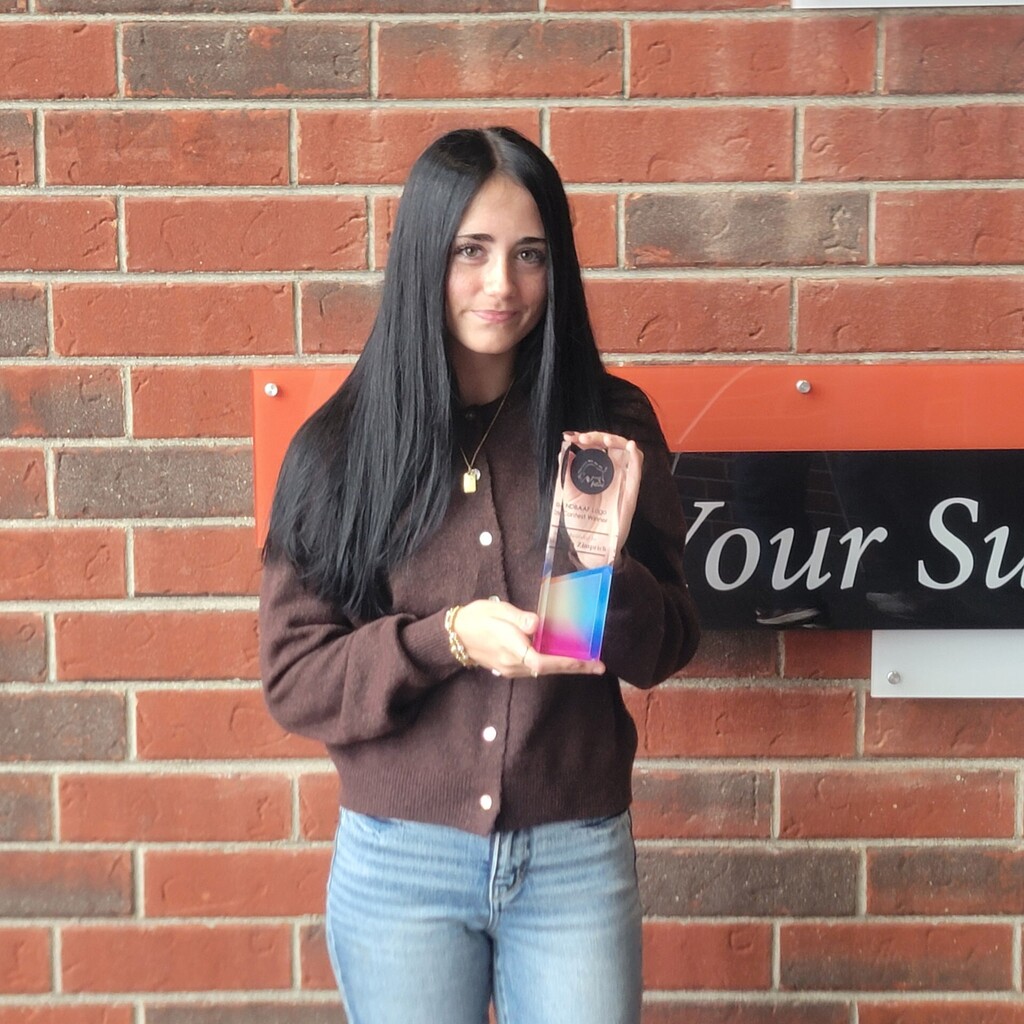 Taylin Receives Award