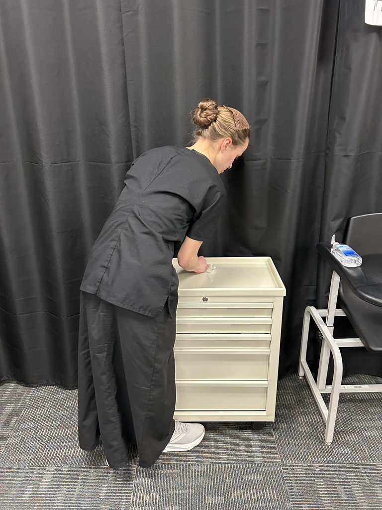 CCMA student cleaning work station