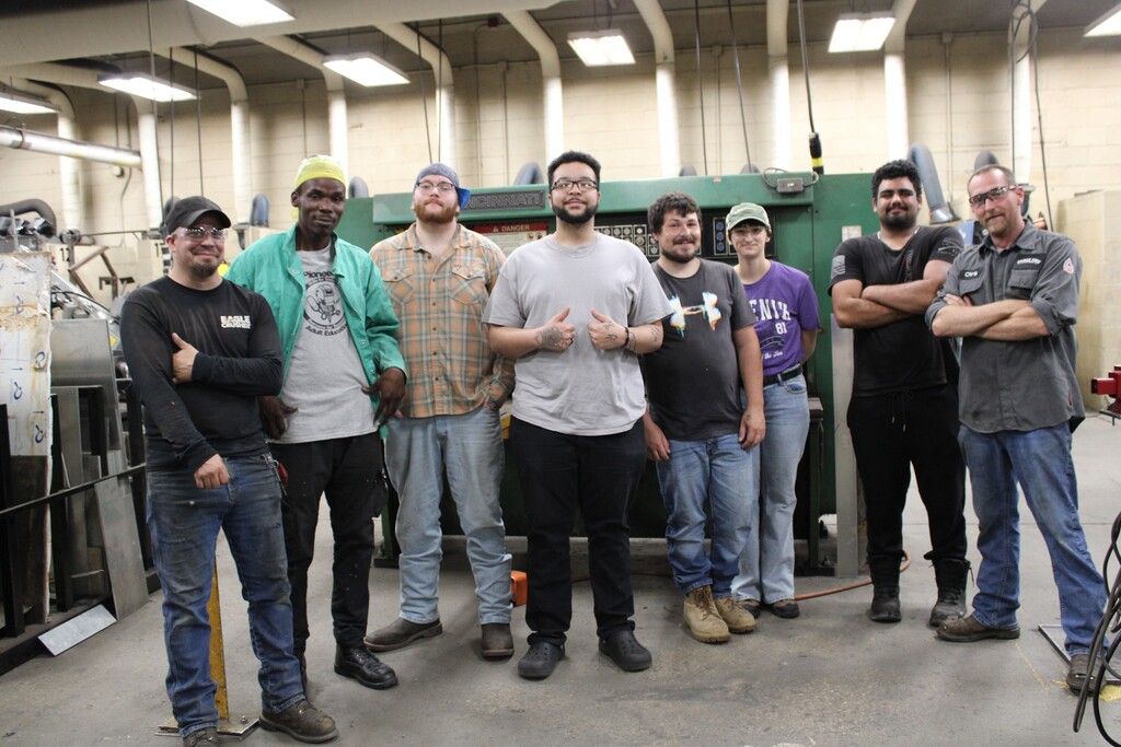 Picture of welding students and instructors