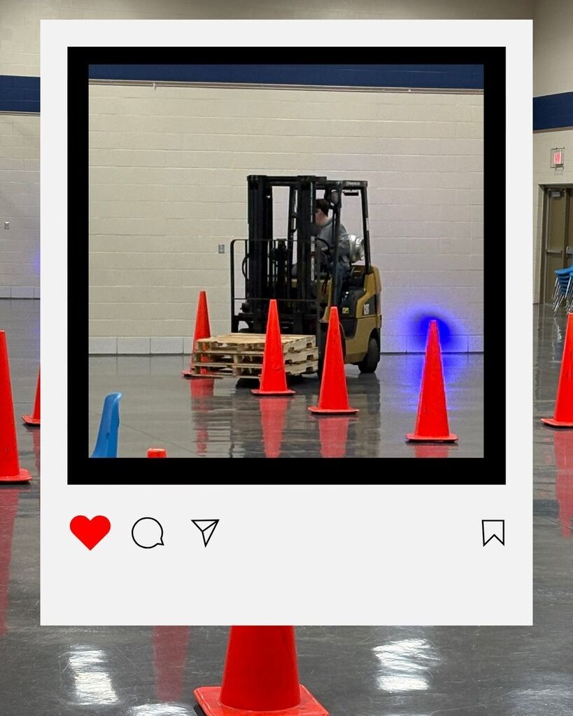 Student driving a Forklift