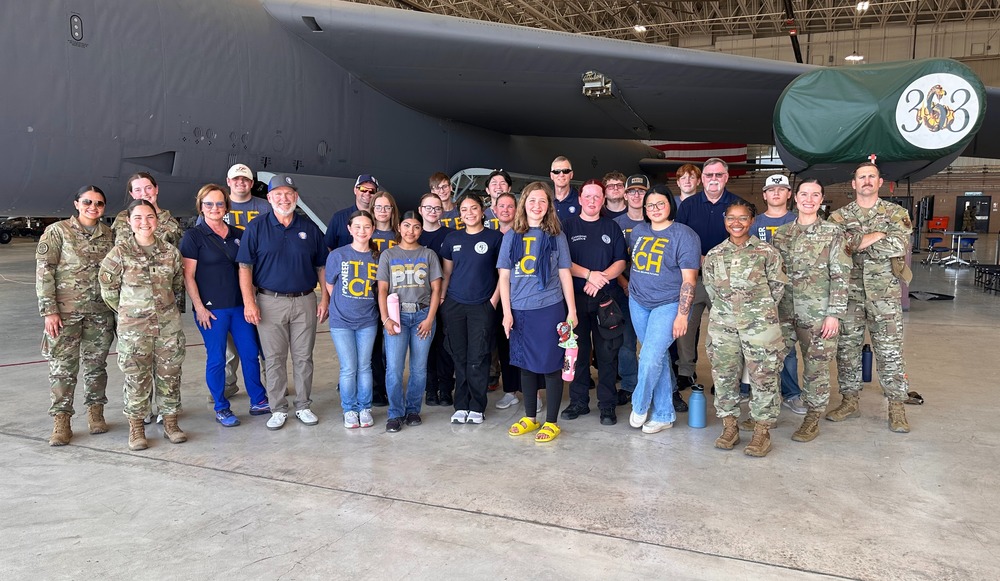 PTC Students with Air Force Personnel in front of an airplane