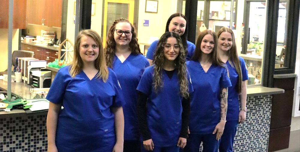 Scholarship Recipients, 5 women in nursing scrubs