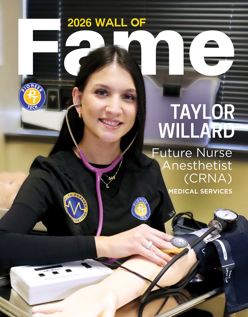 Girl holding stethoscope and posing at Pioneer Tech