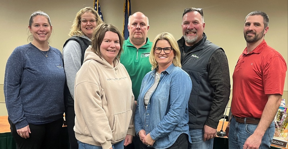 7 School Board Members posing in a picture