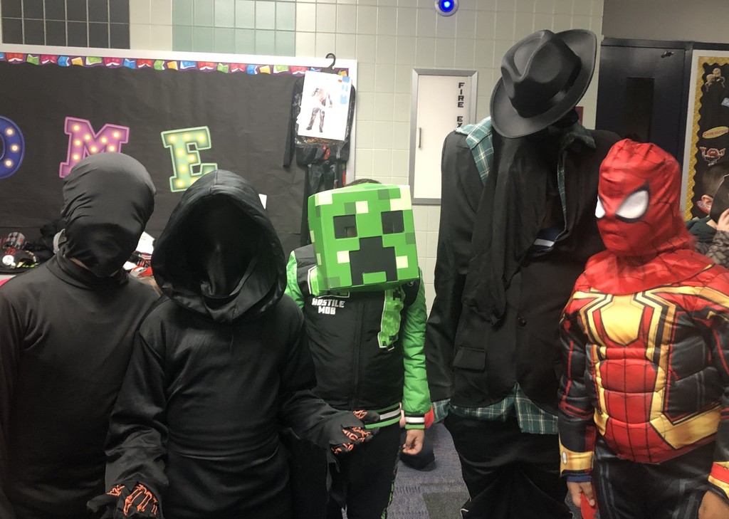 students in Halloween costumes