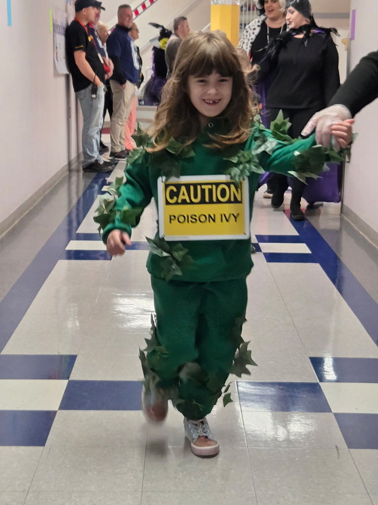 Teacher and student dressed in halloween costumes