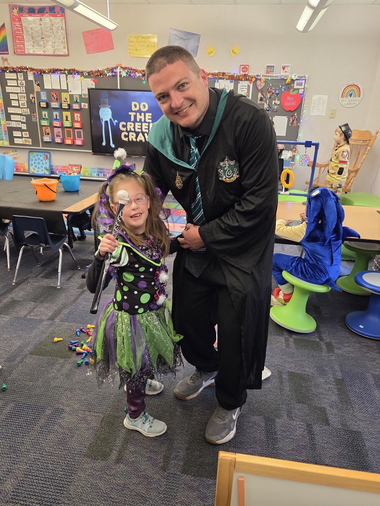 Teacher and student dressed in halloween costumes