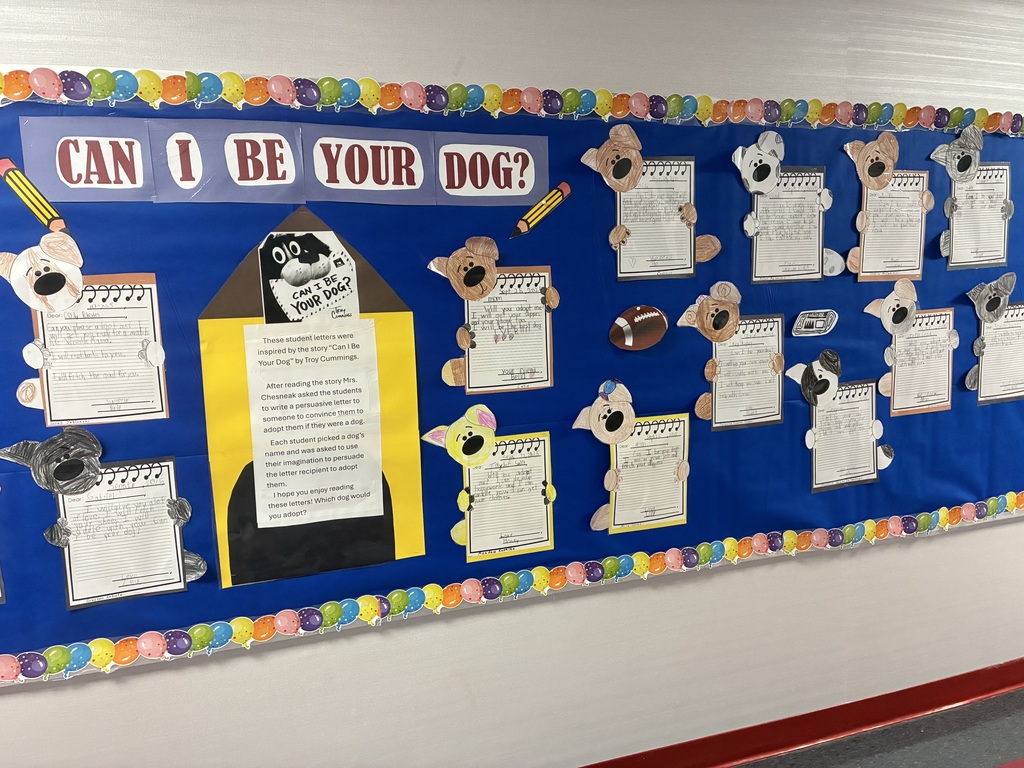 School bulletin board with fall writing.