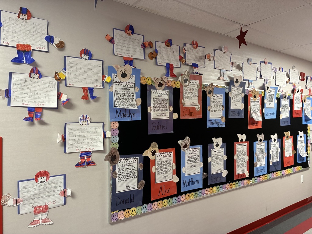 School bulletin board with fall writing.