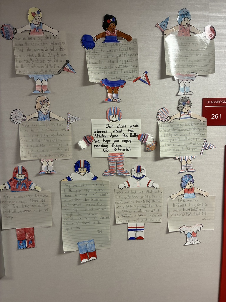 School bulletin board with fall writing.