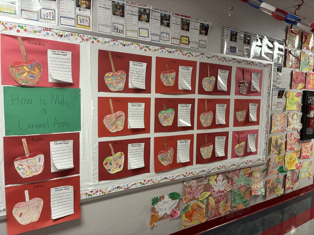 School bulletin board with fall writing.