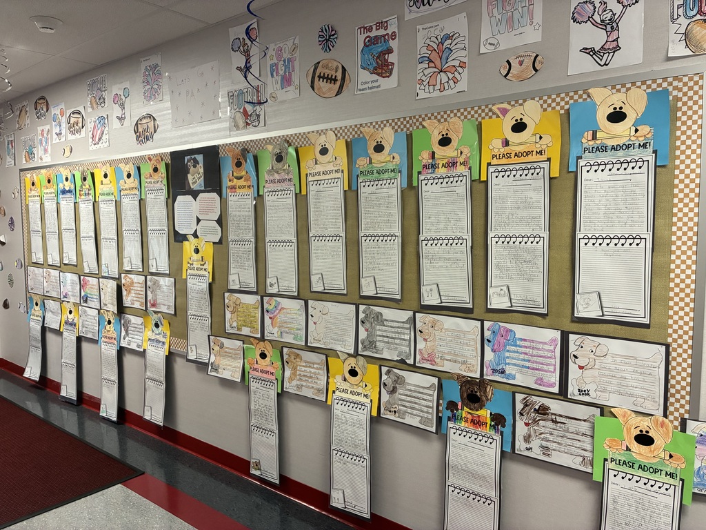 School bulletin board with fall writing.