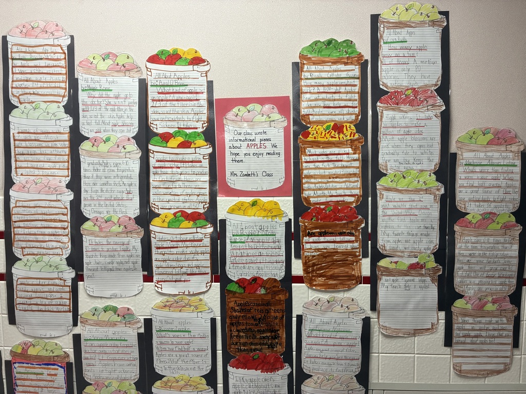 School bulletin board with fall writing.