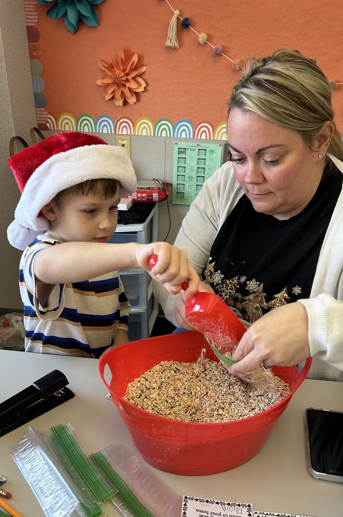 A student mixing reindeer food.