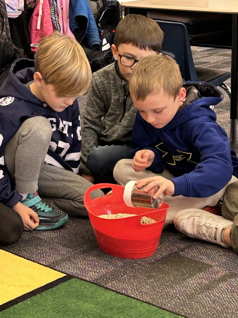 A student mixing reindeer food.